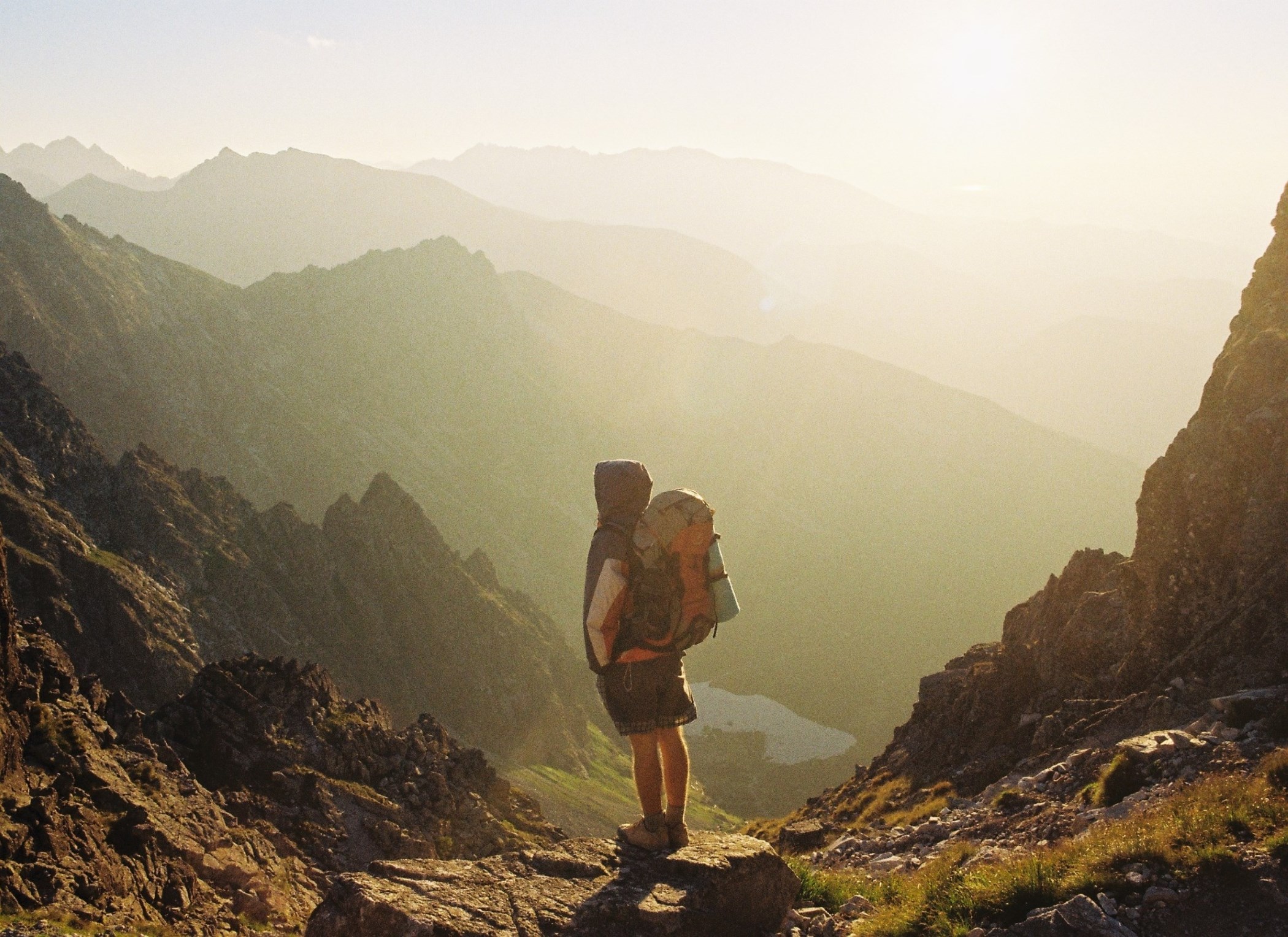 Image showing a man looking towards mountains, depicting vision